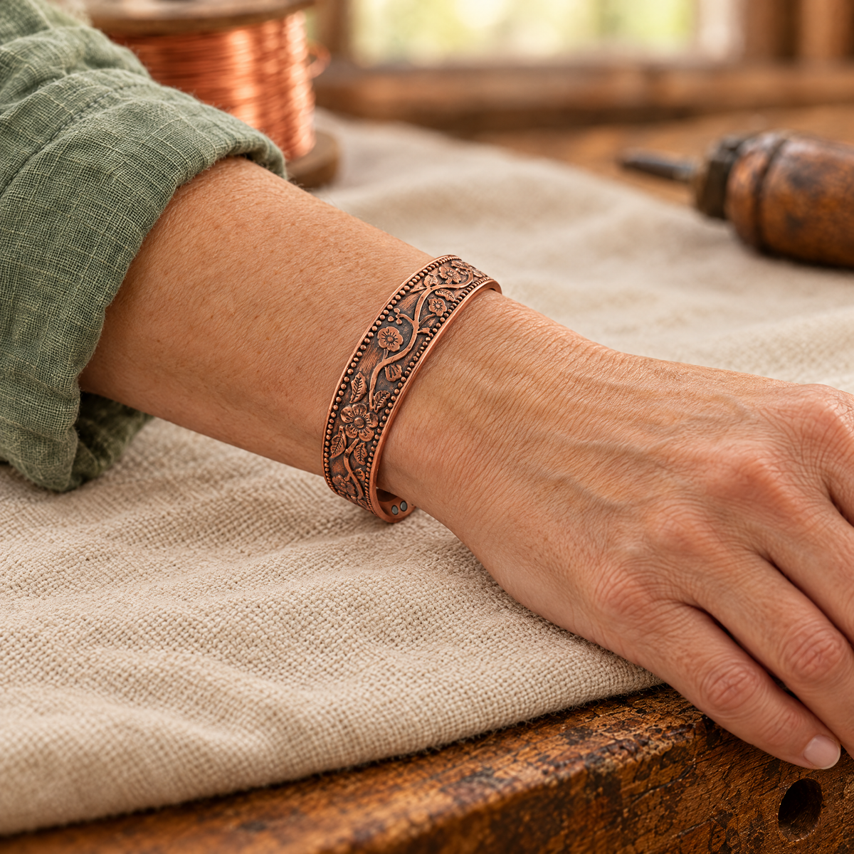 Wildflower Copper Cuff on the wrist